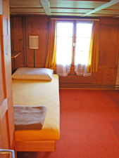 Ferienhaus Mattli Schlafzimmer