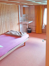 Ferienhaus Mattli Schlafzimmer