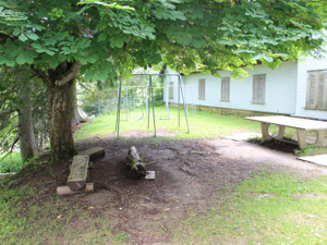 the playground between the house and the bowling alley