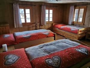 Schlafzimmer in der Ferienwohnung "Surselvina"